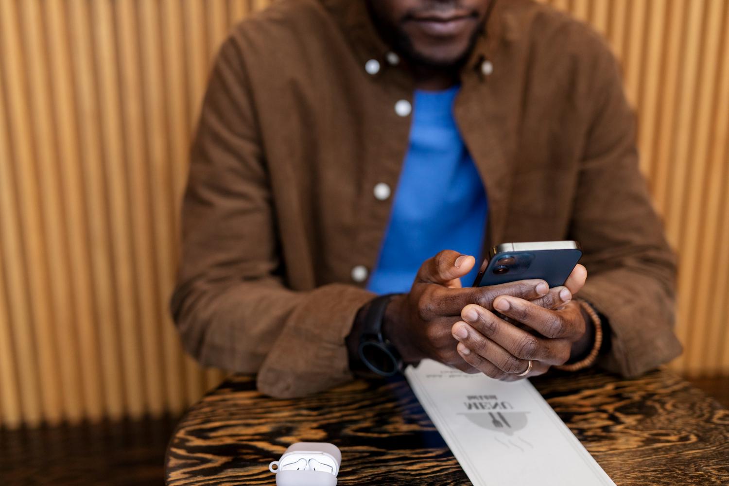 person holding his phone